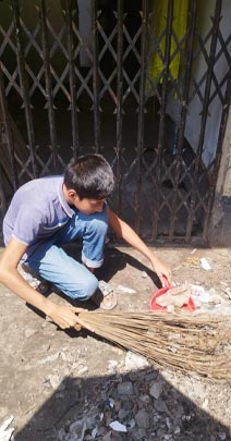 Arman cleaning the neighborhood