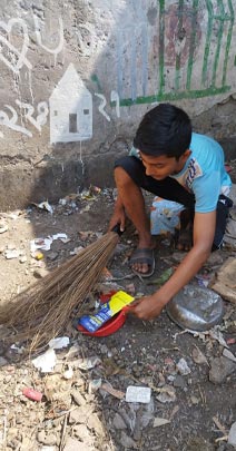 Jahid cleaning the neighborhood