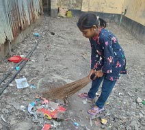 Nusrat cleaning the neighborhood