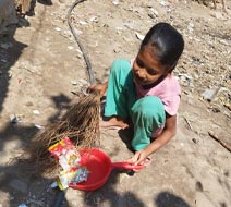 Tanjila cleaning the neighborhood