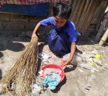 Taskiya cleaning the neighborhood